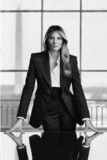 Melania Trump in black and white, in the White House with the Washington Monument in the Background